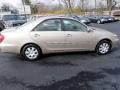 2003 Desert Sand Mica Toyota Camry LE  photo #6