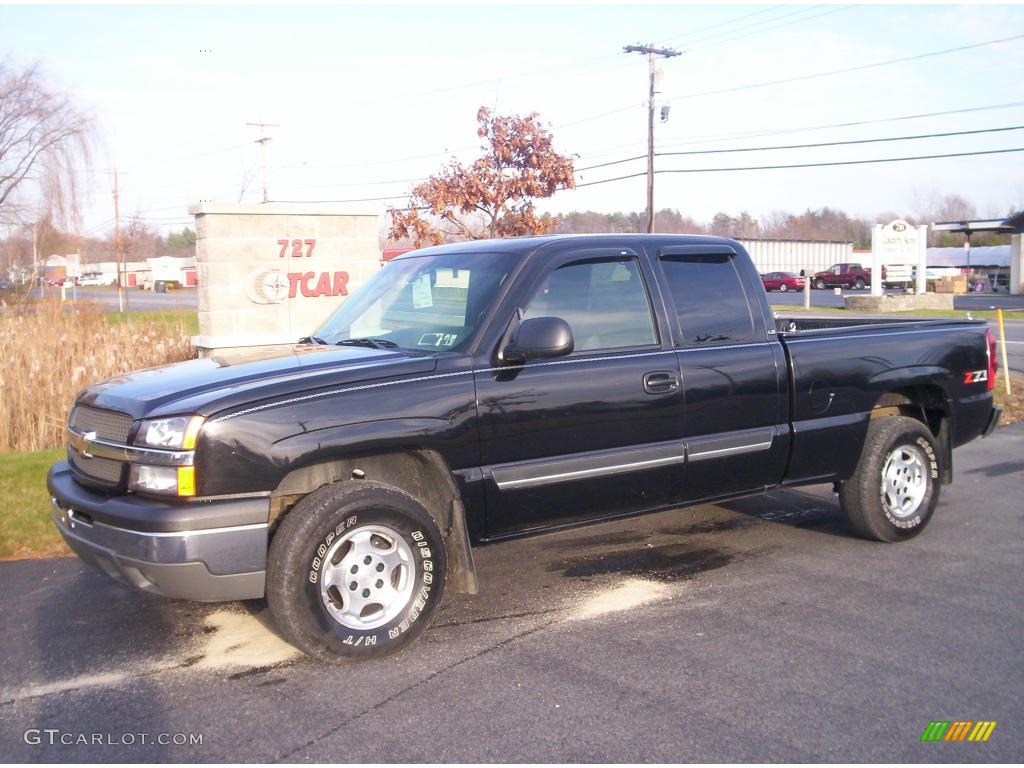 2003 Silverado 1500 LS Extended Cab 4x4 - Black / Dark Charcoal photo #1