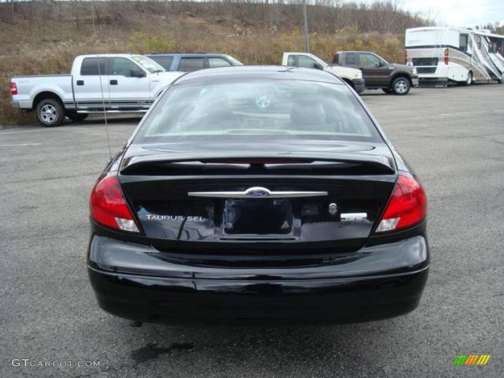 2003 Taurus SEL - Black / Medium Parchment photo #4