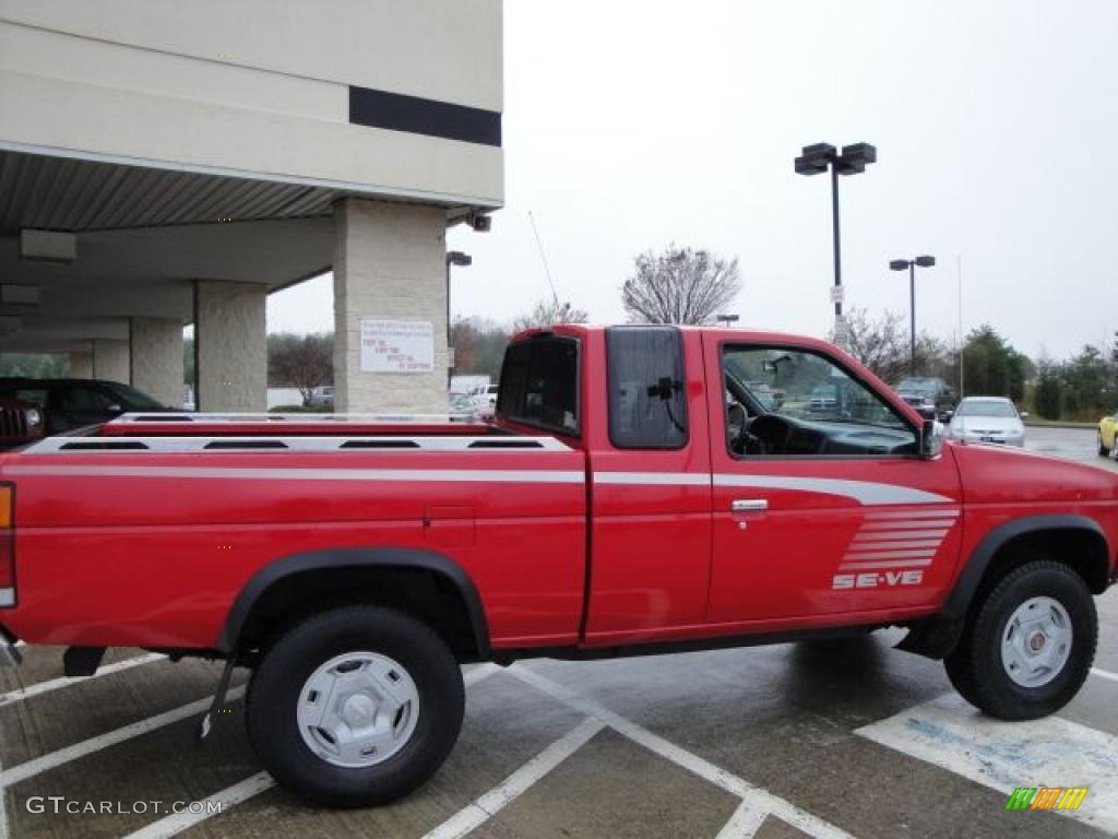 1995 Hardbody Truck SE V6 Extended Cab 4x4 - Aztec Red / Gray photo #2