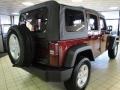 2010 Red Rock Crystal Pearl Jeep Wrangler Unlimited Sport 4x4  photo #4