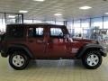 2010 Red Rock Crystal Pearl Jeep Wrangler Unlimited Sport 4x4  photo #5