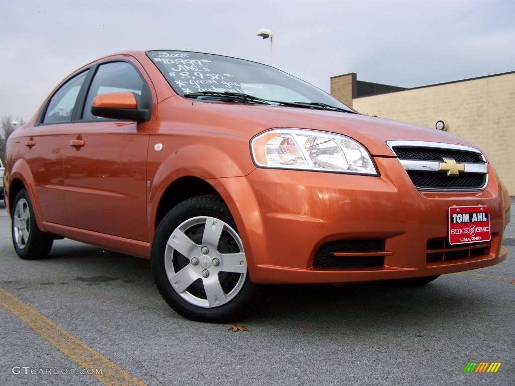 2008 Aveo LS Sedan - Spicy Orange Metallic / Charcoal photo #1