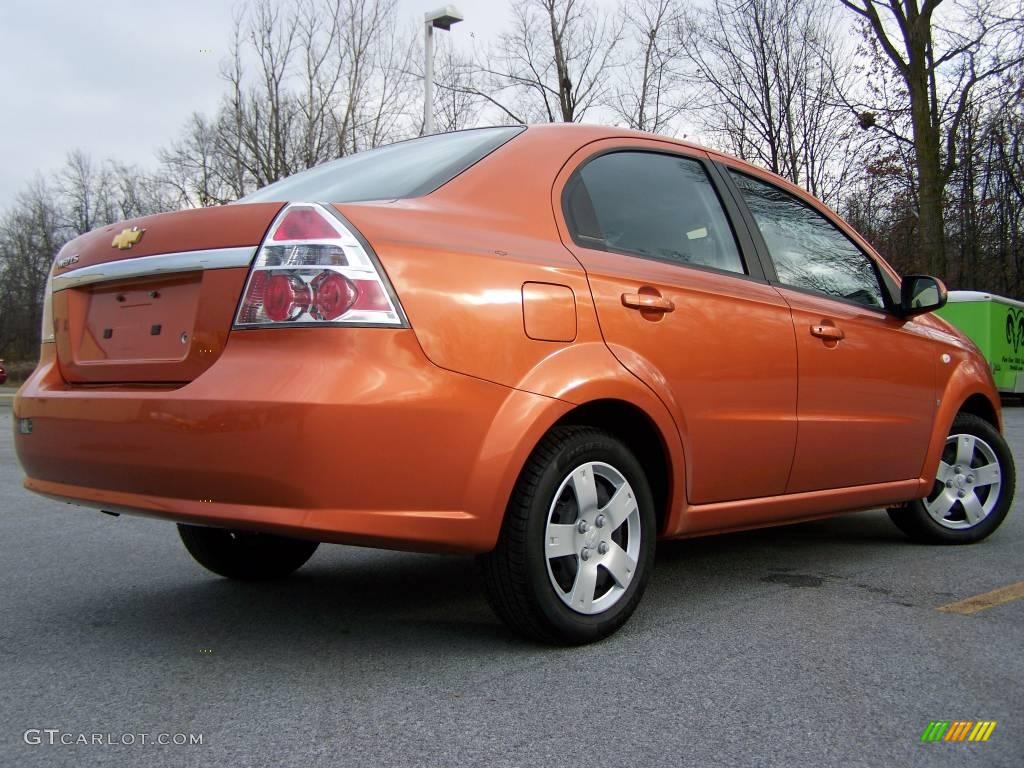 2008 Aveo LS Sedan - Spicy Orange Metallic / Charcoal photo #7