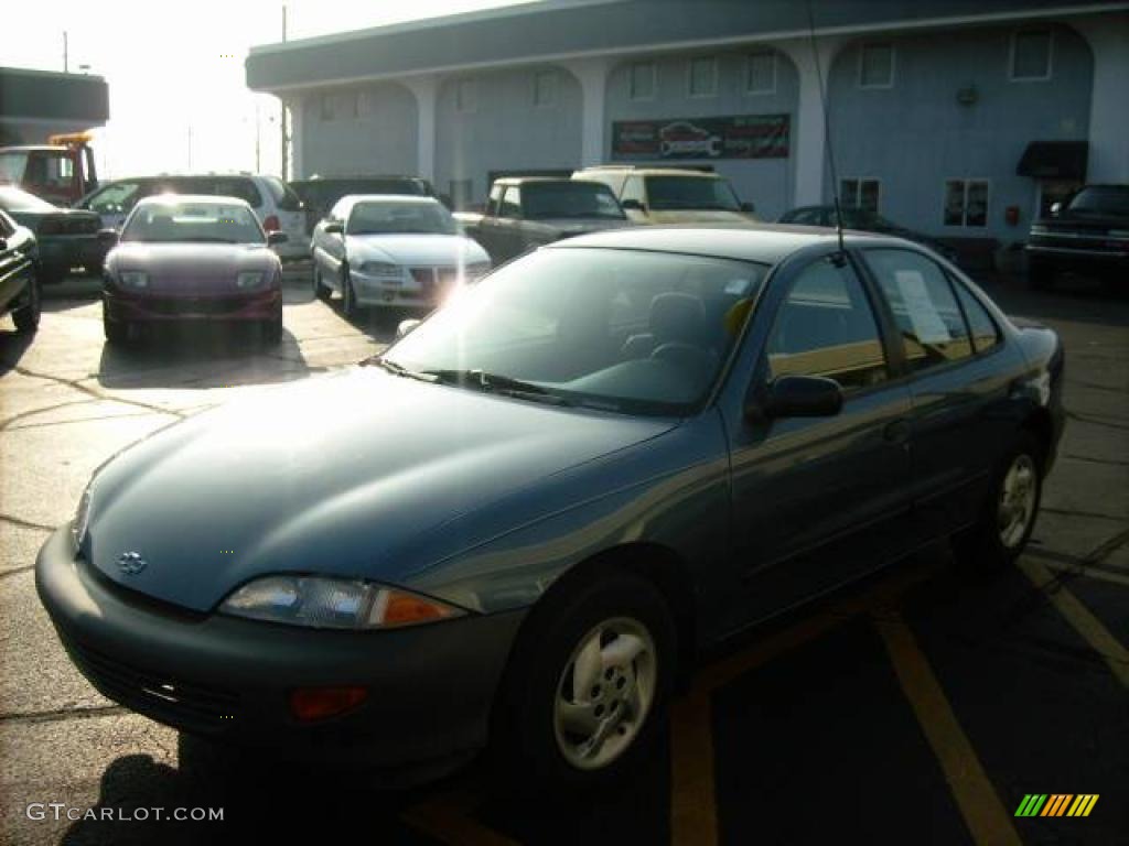 1997 Cavalier Sedan - Medium Opal Blue Metallic / Graphite photo #8
