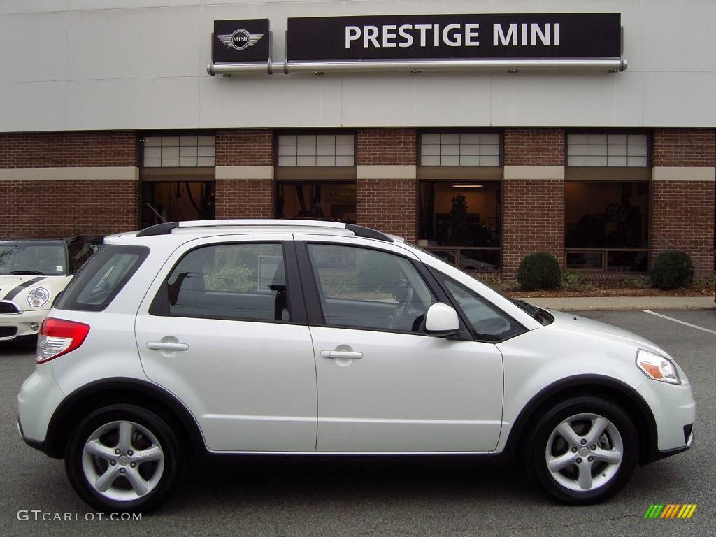 2009 SX4 Crossover AWD - White Water Pearl / Black photo #1