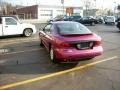 1995 Raspberry Metallic Pontiac Sunfire SE Coupe  photo #5