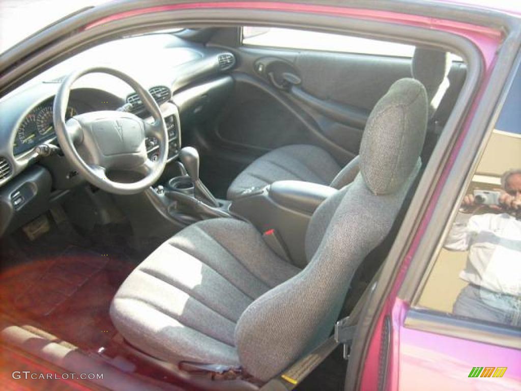 1995 Sunfire SE Coupe - Raspberry Metallic / Gray photo #8