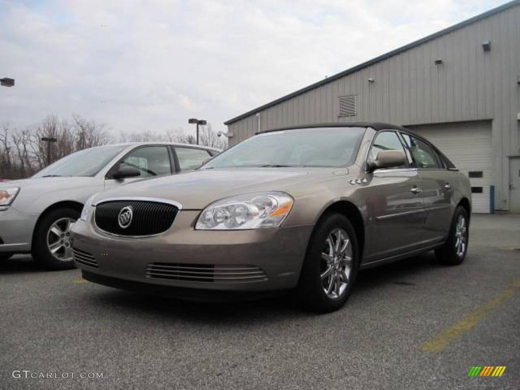 2006 Lucerne CXL - Sandstone Metallic / Cashmere photo #1