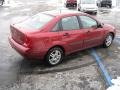 2000 Sangria Red Metallic Ford Focus LX Sedan  photo #4