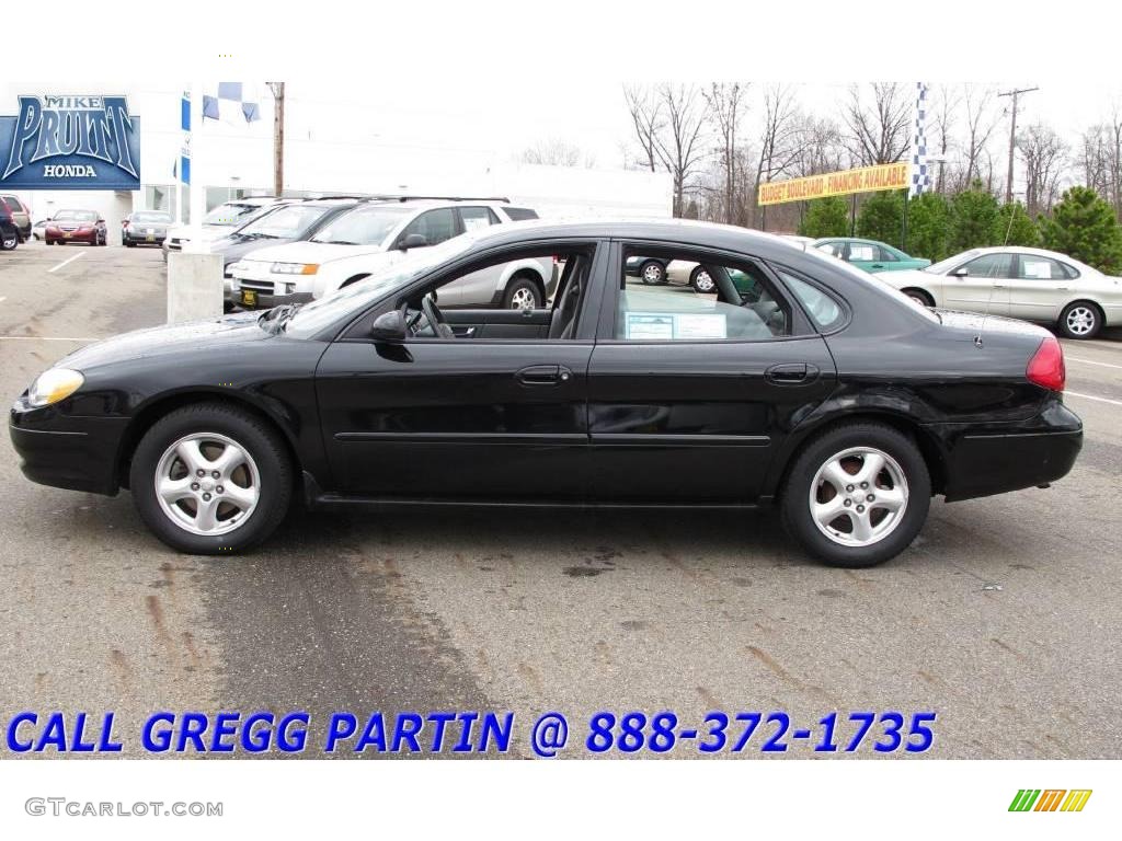 Black Ford Taurus