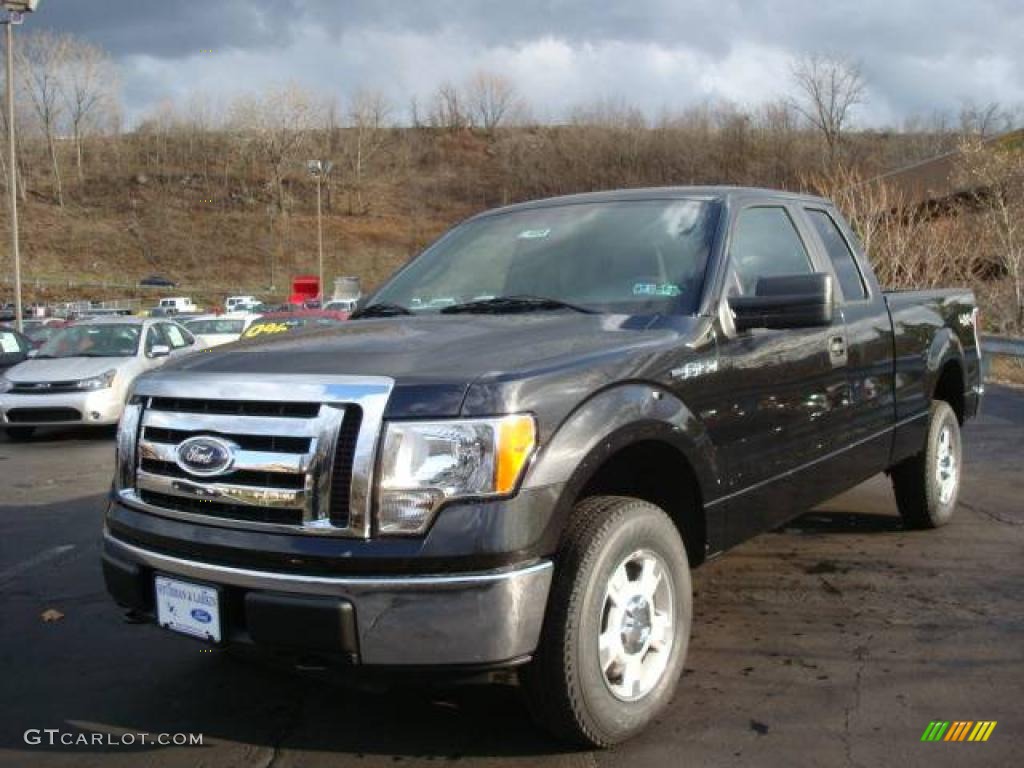 2010 F150 XLT SuperCab 4x4 - Tuxedo Black / Medium Stone photo #7