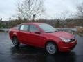 2010 Sangria Red Metallic Ford Focus SES Sedan  photo #1