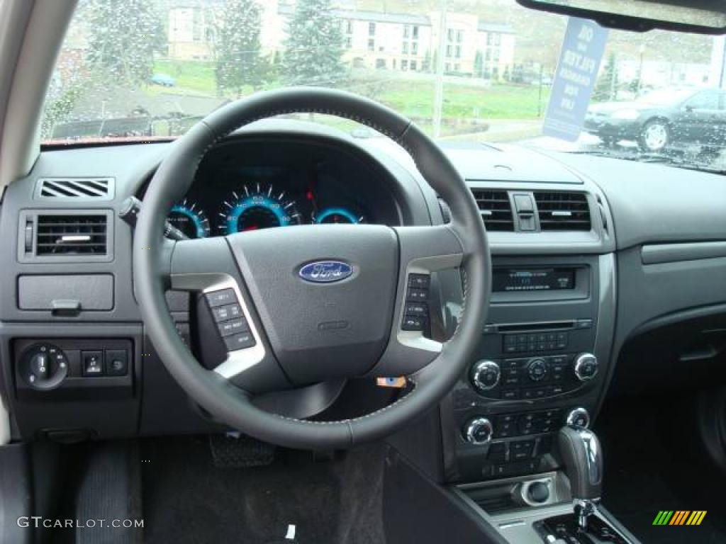 2010 Fusion Sport AWD - Sangria Red Metallic / Charcoal Black/Sport Black photo #12