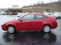 2010 Sangria Red Metallic Ford Focus SE Coupe  photo #6