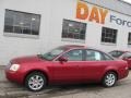 Vivid Red Metallic - Montego Luxury AWD Photo No. 2