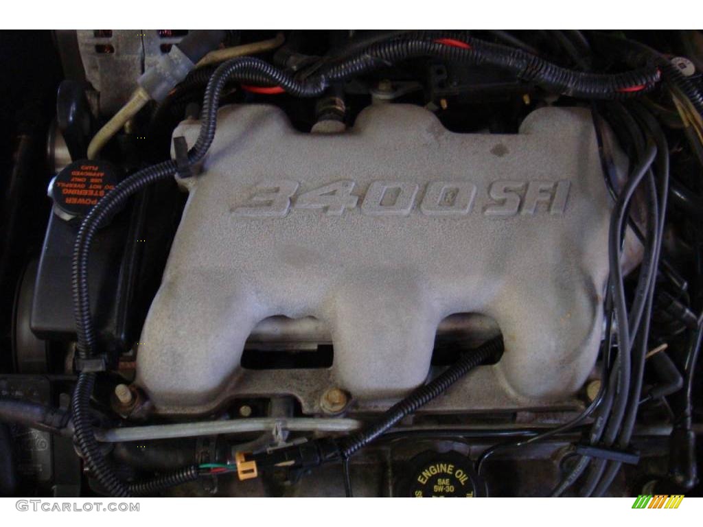 2000 Grand Am SE Coupe - Redfire Metallic / Dark Taupe photo #19