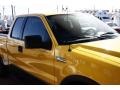 2004 Blazing Yellow Ford F150 FX4 SuperCab 4x4  photo #17