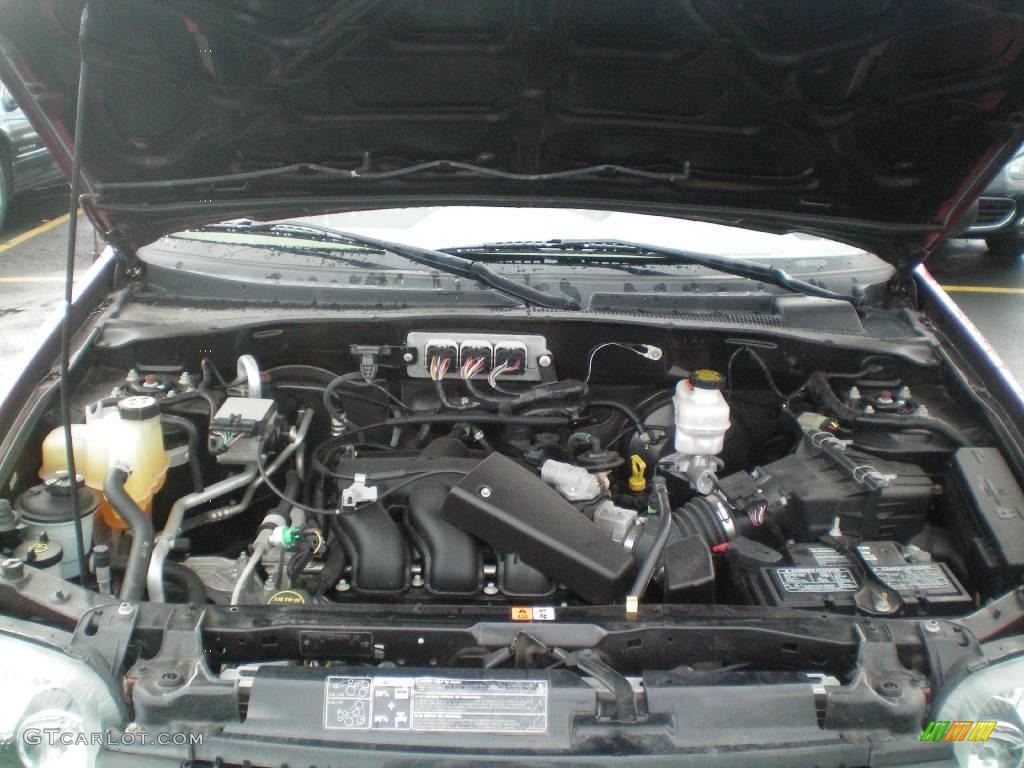 2006 Escape XLT V6 4WD - Redfire Metallic / Medium/Dark Pebble photo #14