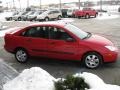 2001 Infra Red Clearcoat Ford Focus SE Sedan  photo #3