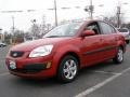 Sunset Orange - Rio LX Sedan Photo No. 1