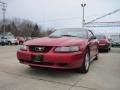2002 Laser Red Metallic Ford Mustang V6 Coupe  photo #1