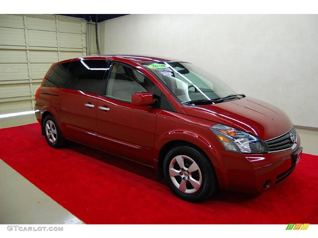 Red Brawn Metallic Nissan Quest