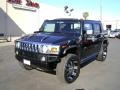 2005 Black Hummer H2 SUT  photo #1