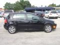 Black Uni - Rabbit 4 Door Photo No. 6