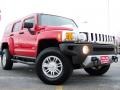 2009 Victory Red Hummer H3   photo #1