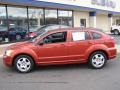 2009 Sunburst Orange Pearl Dodge Caliber SXT  photo #3