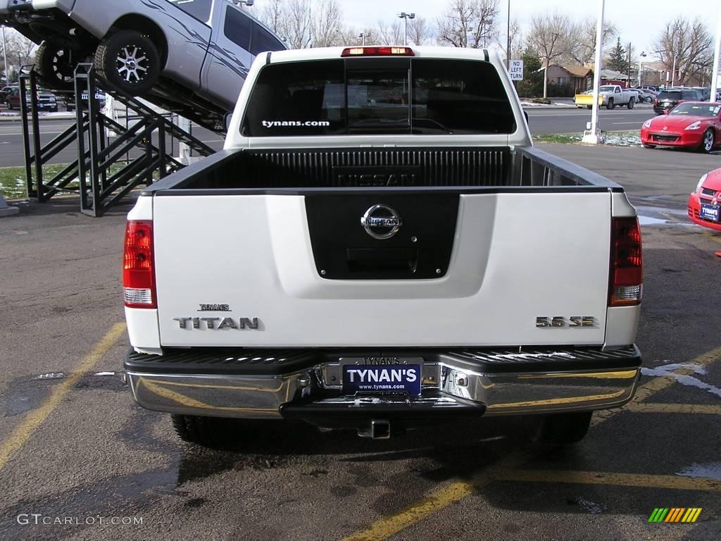 2005 Titan SE King Cab 4x4 - White / Steel photo #5