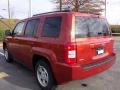 2010 Sunburst Orange Pearl Jeep Patriot Sport  photo #2