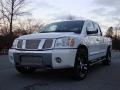 2004 White Nissan Titan LE Crew Cab  photo #22