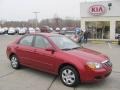 2009 Spicy Red Metallic Kia Spectra EX Sedan  photo #1