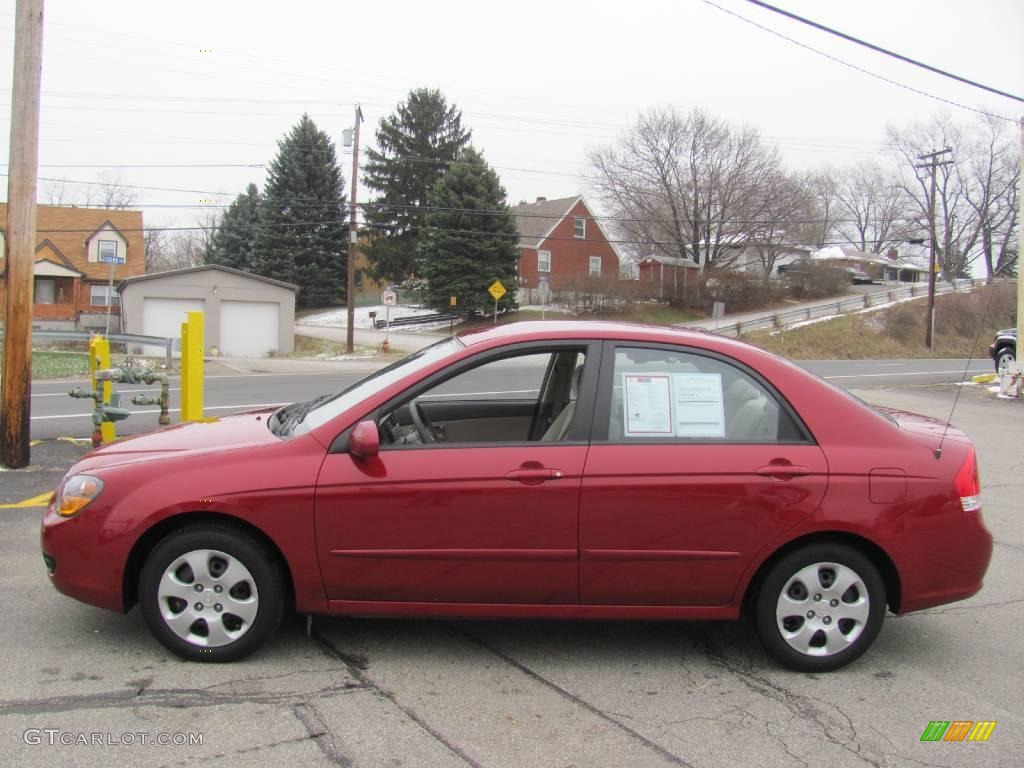 2009 Spectra EX Sedan - Spicy Red Metallic / Beige photo #6