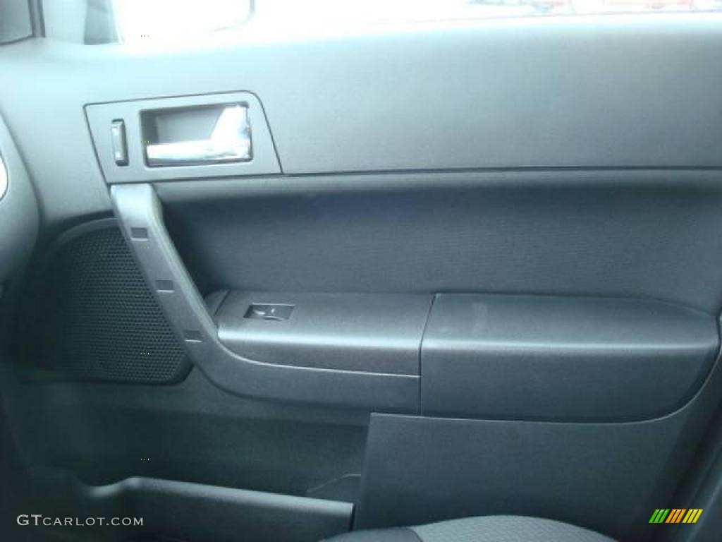 2010 Focus SES Sedan - Sterling Grey Metallic / Charcoal Black photo #17