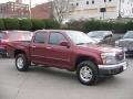 2009 Sonoma Red Metallic GMC Canyon SLE Crew Cab 4x4  photo #8