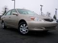 2003 Desert Sand Mica Toyota Camry LE  photo #1