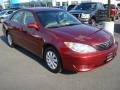 2005 Salsa Red Pearl Toyota Camry LE  photo #8