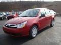 2010 Sangria Red Metallic Ford Focus SE Sedan  photo #7