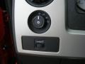 2010 Ford F150 Raptor Black/Orange Interior Controls Photo