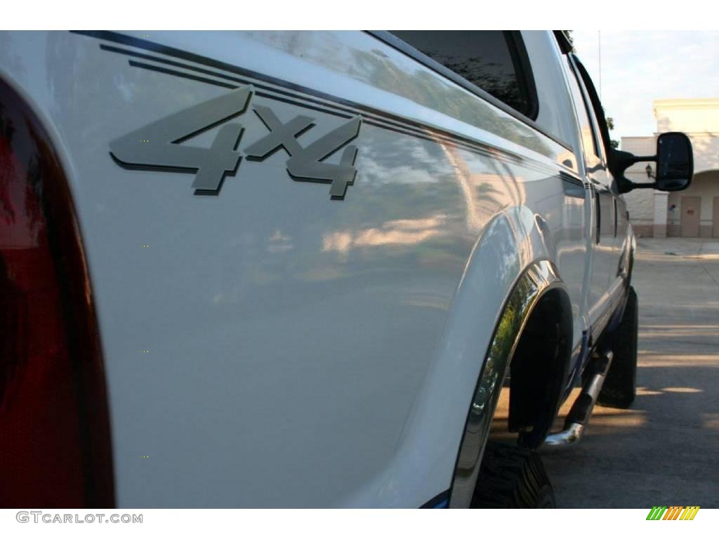 2000 F250 Super Duty XLT Crew Cab 4x4 - Oxford White / Dark Denim Blue photo #15
