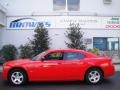 2009 TorRed Dodge Charger SXT  photo #1