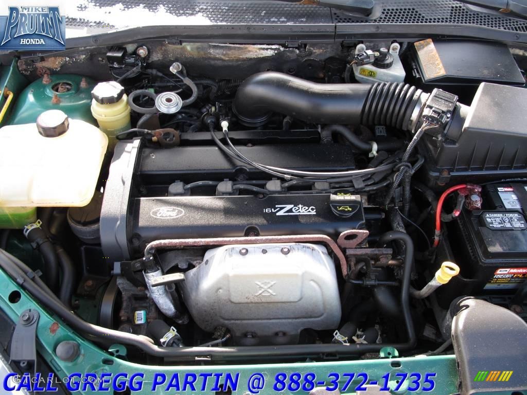 2002 Focus SE Sedan - Grabber Green Metallic / Medium Graphite photo #20