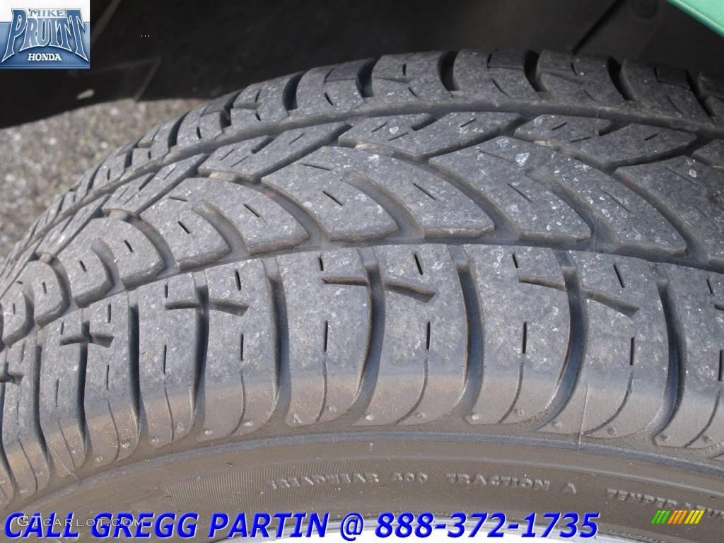 2002 Focus SE Sedan - Grabber Green Metallic / Medium Graphite photo #21