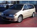 2002 Mesa Beige Metallic Honda Odyssey EX-L  photo #1