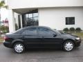 2004 Onyx Black Mazda MAZDA6 i Sedan  photo #6