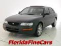 1996 Deep Evergreen Pearl Nissan Maxima GXE #23516238