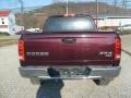 2004 Deep Molten Red Pearl Dodge Ram 1500 SLT Quad Cab 4x4  photo #4